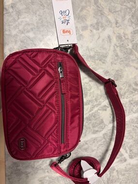 lug super coupe crossbody bag in raspberry